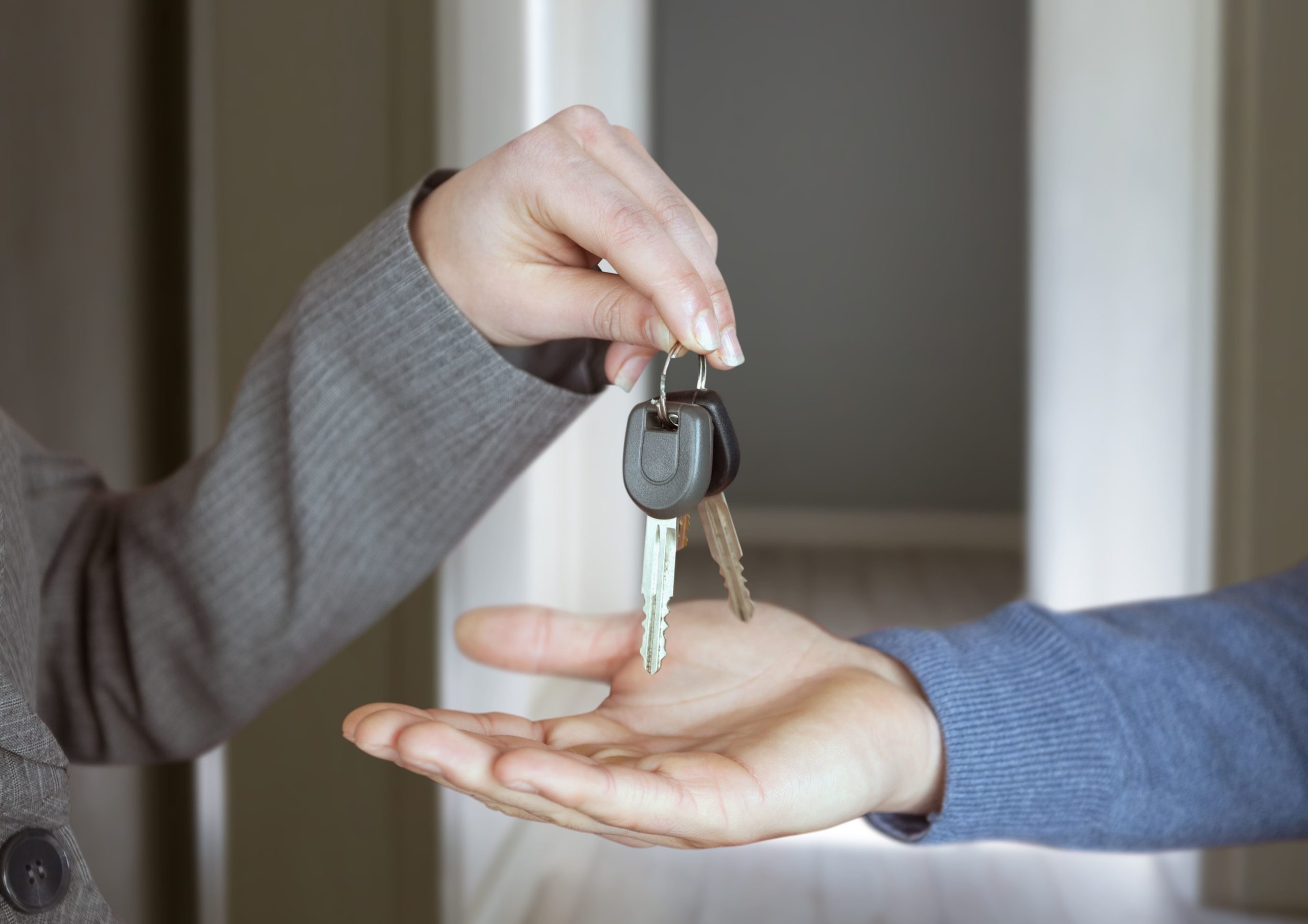 Hands Holding key in home